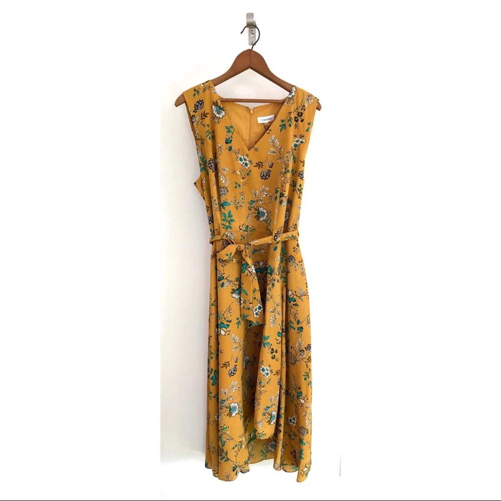 Brand new Calvin Klein golden dress